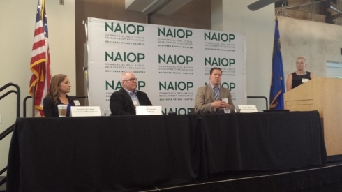 Jennifer Turchinj of Coda moderates a discussion of utility-scale renewable energy at a recent NAIOP meeting. Photo by Dana Berggren, NAIOP commercial real estate broker.